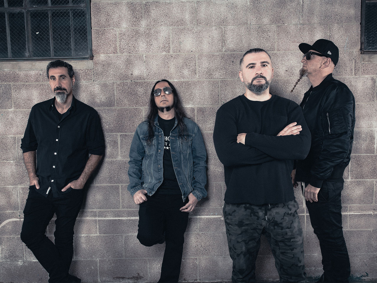 An image of the members of the band System of a Down 
