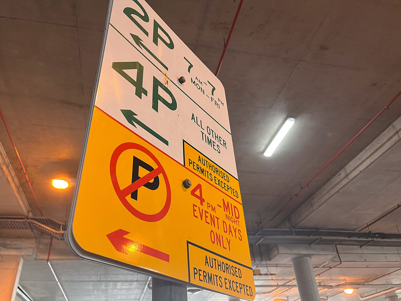 Sign showing parking restrictions on both normal and event days.