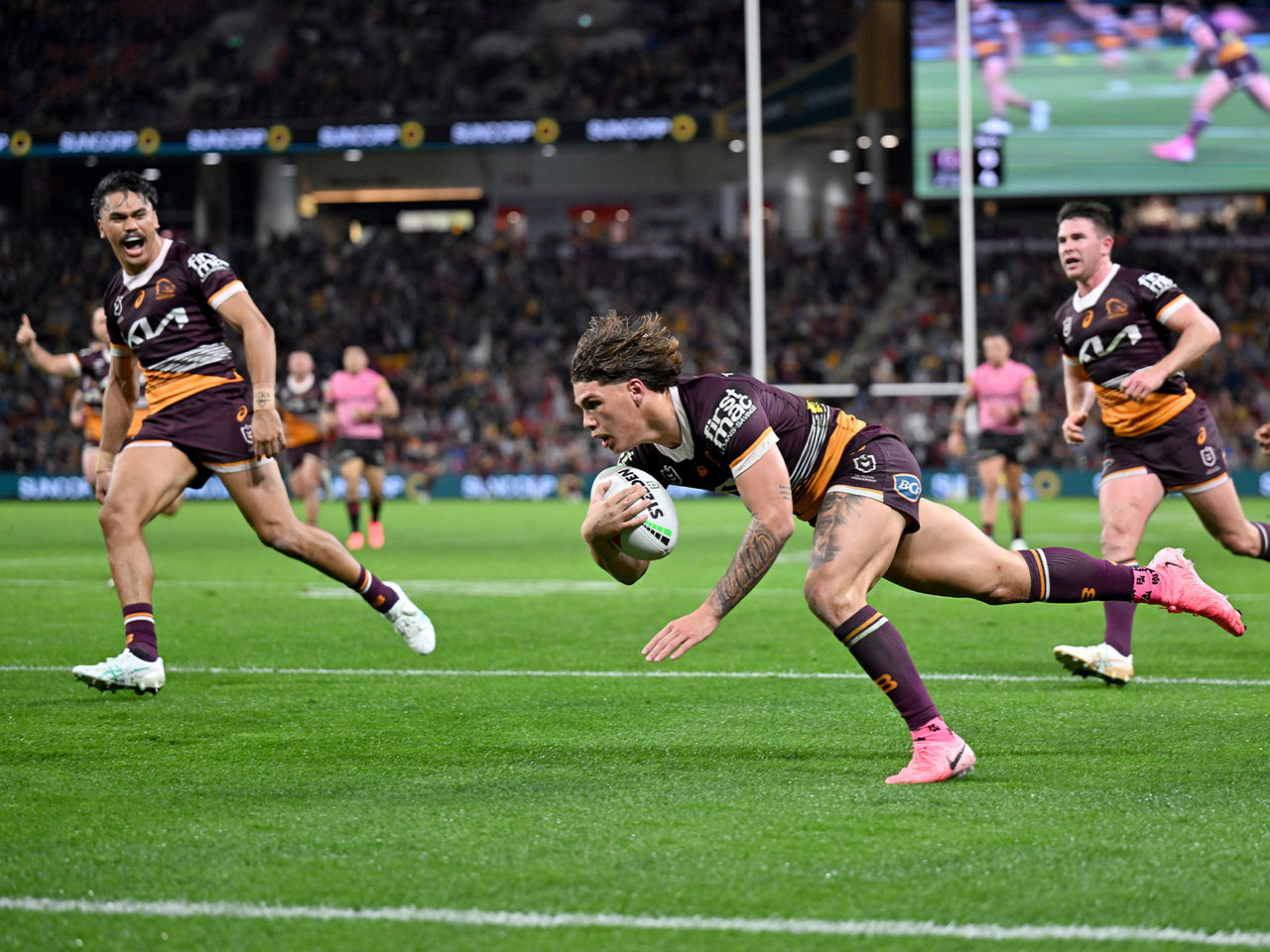 Broncos Player Reece Walsh diving over the line to score a try