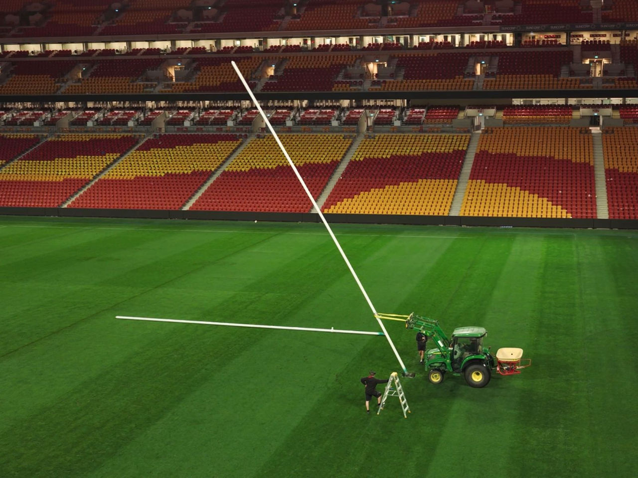 Suncorp Stadium Grounds Team taking our the rugby league Goals on the field