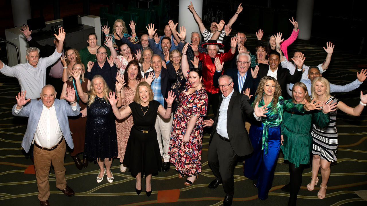 Group photo of staff members excited to be celebrating multiple years of service.