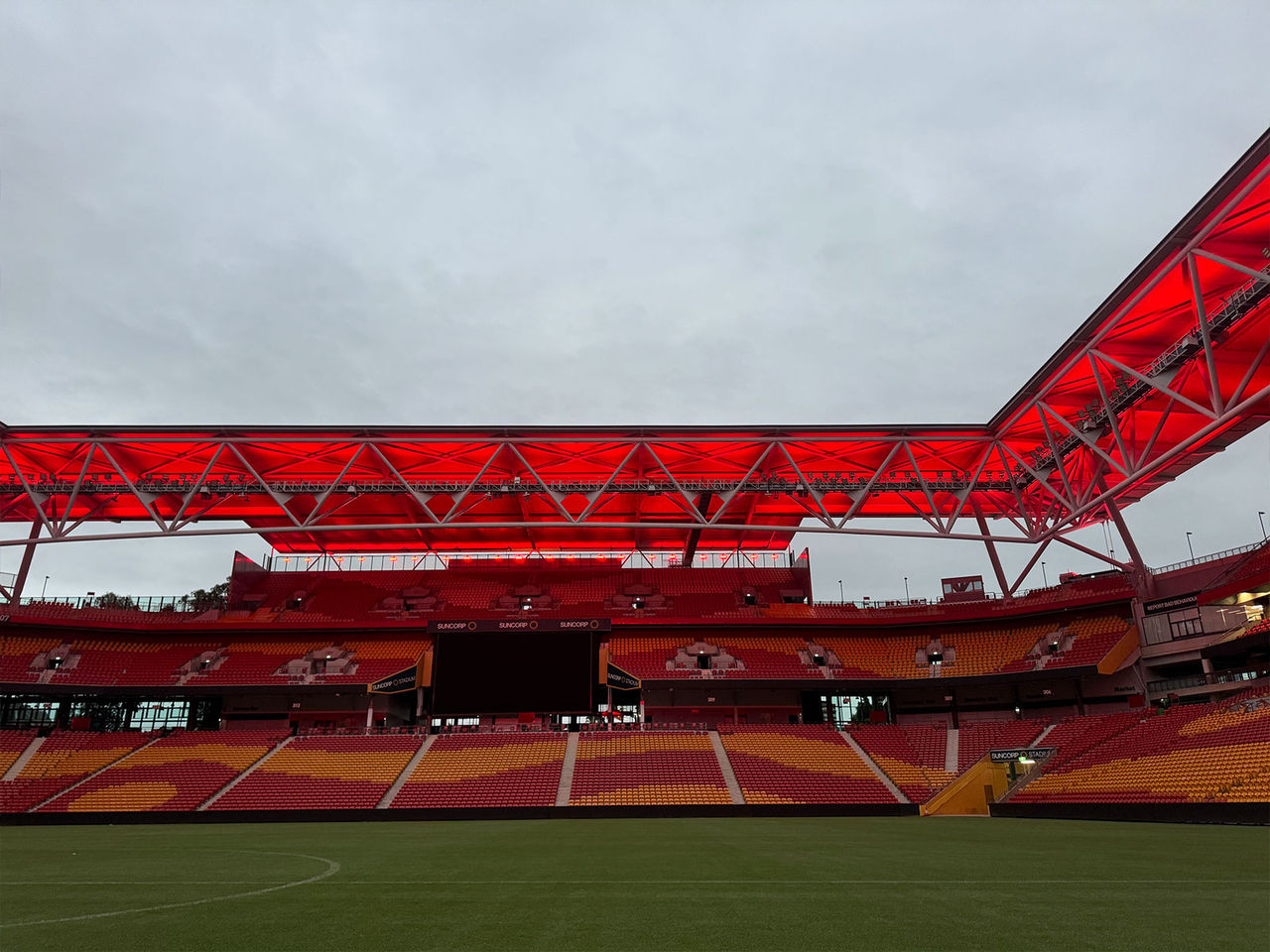 An image inside Suncorp Stadium with Red Stadium lighting