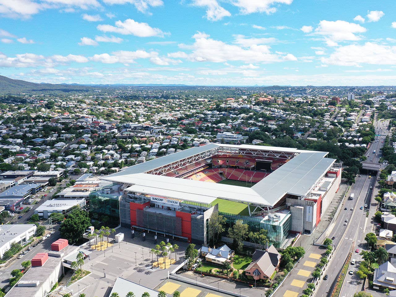 Aerial view of Southern entrance of Suncorp Stadium and surrounding suburbs on a sunny day. 