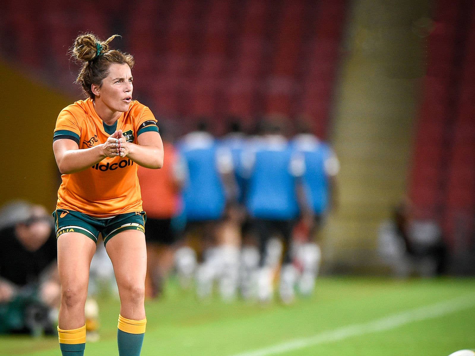 A Wallaroos Womens player about to take the kick of goal at Suncorp Stadium