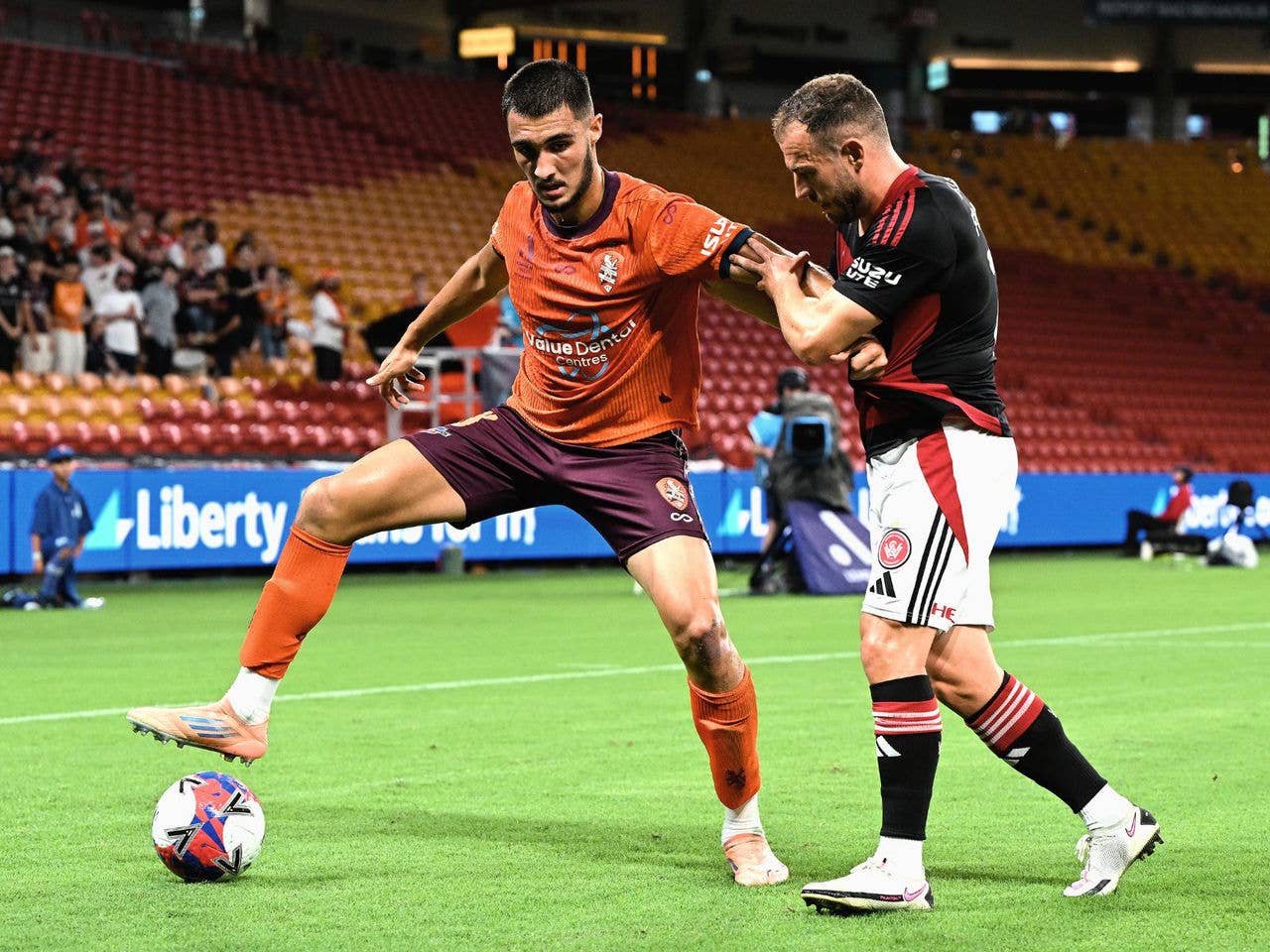 Dimitri Valkanis Brisbane Roar player with the ball against Wanderers