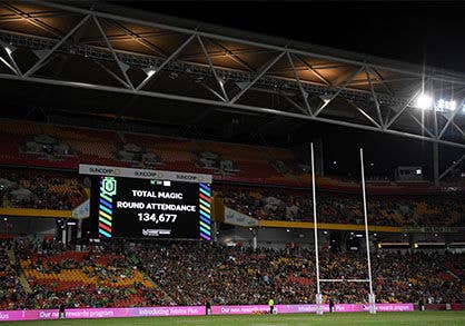 Inside Suncorp Stadium during Magic Round 2019. Crowd attendance figure of 134677 is displayed on the big screen.