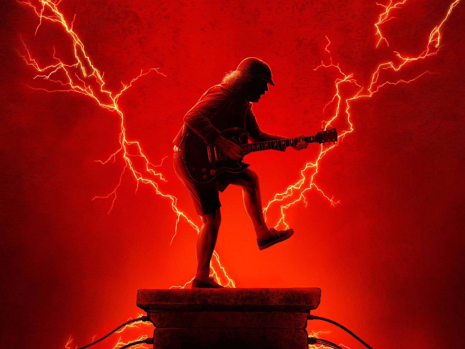 Picture of ACDC guitarist silhouette with red background and lighting