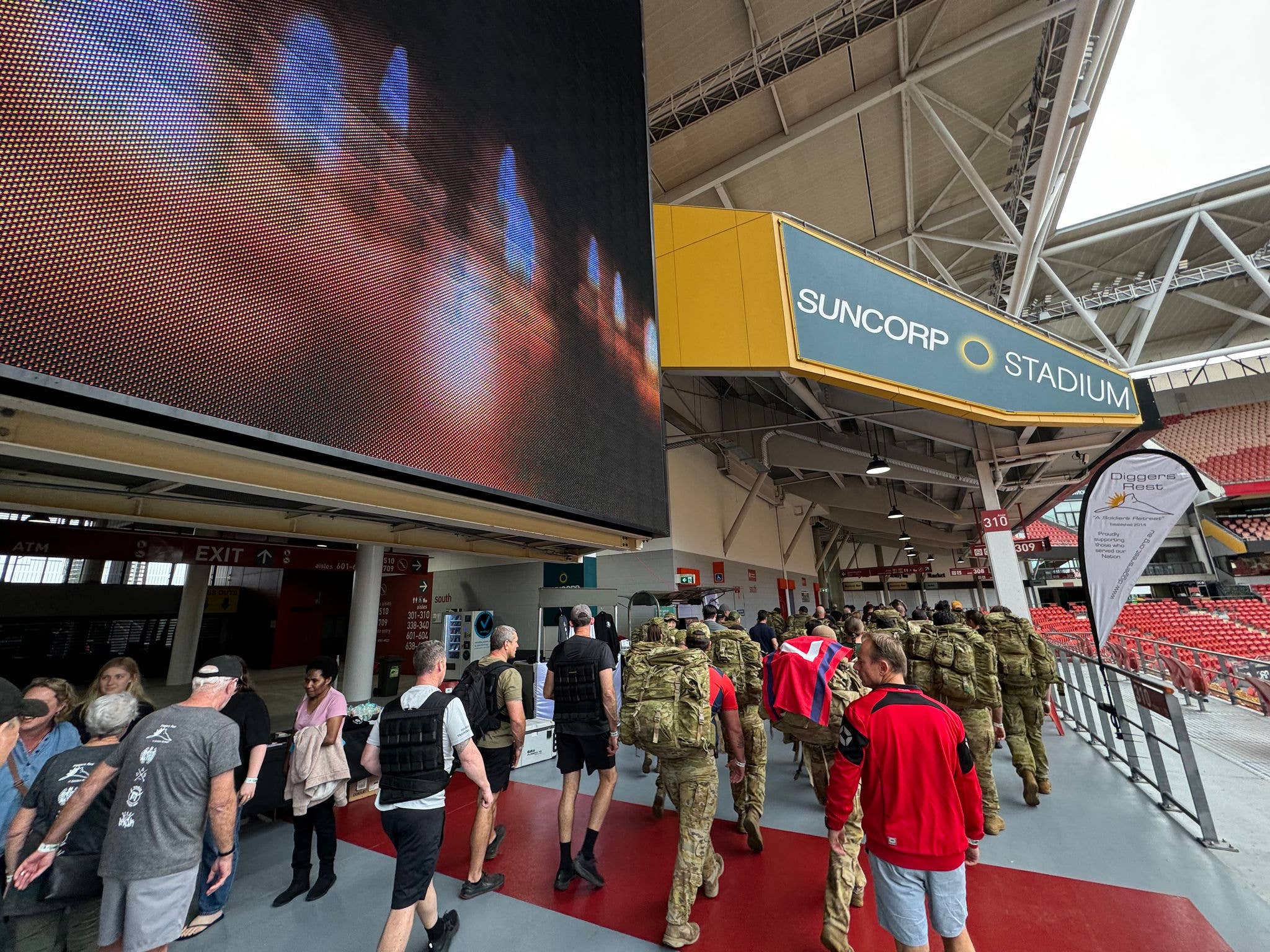 The 42 for 42 42 hour challenge begins as walkers start laps of the Suncorp Stadium Level 3 concourse