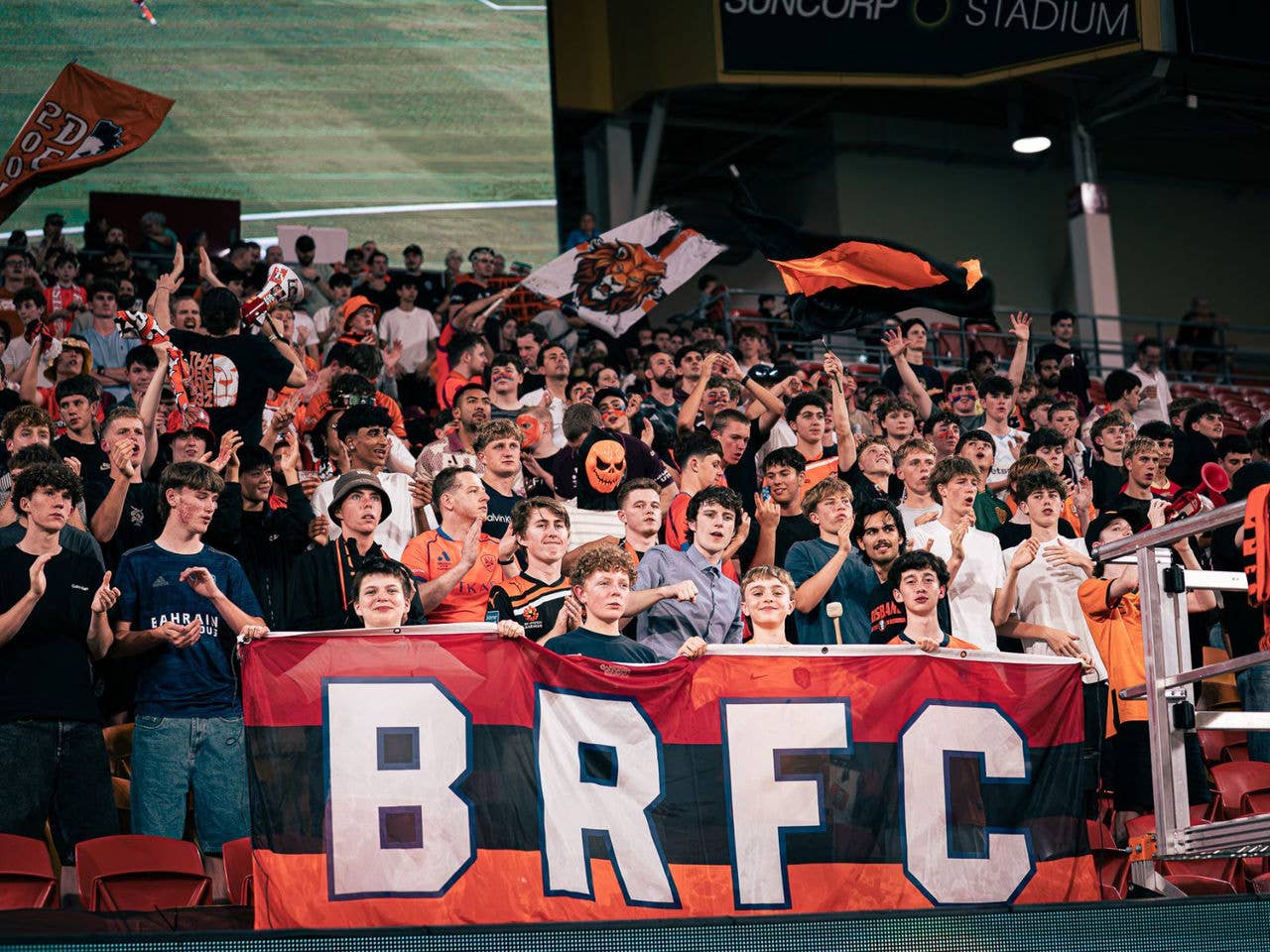 Brisbane Roar Den Supporters cheering their team from the stands