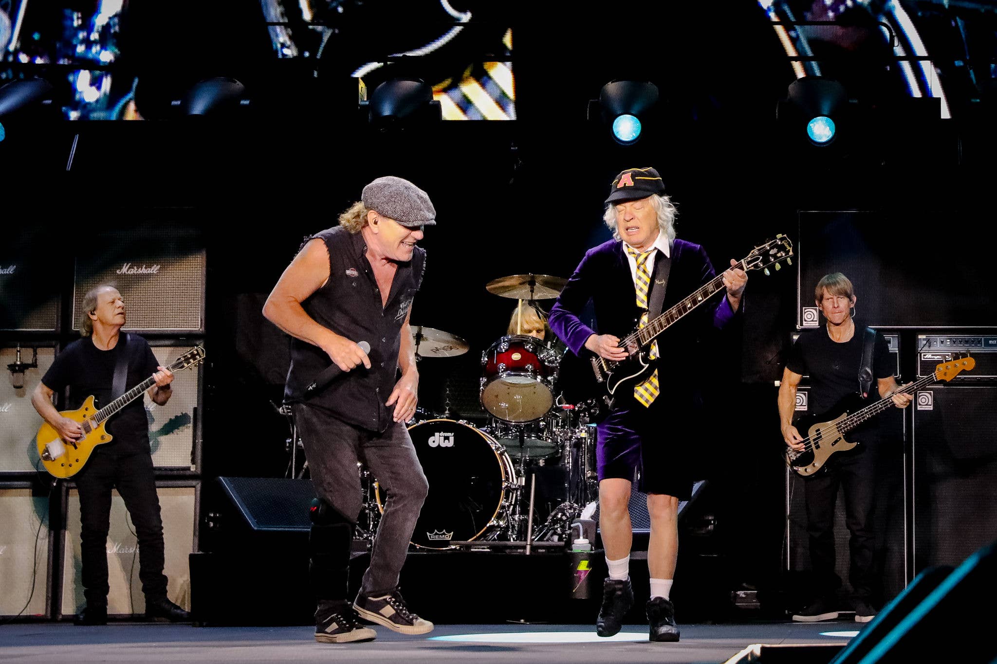 ACDC on stage An image of two ACDC band members on stage together