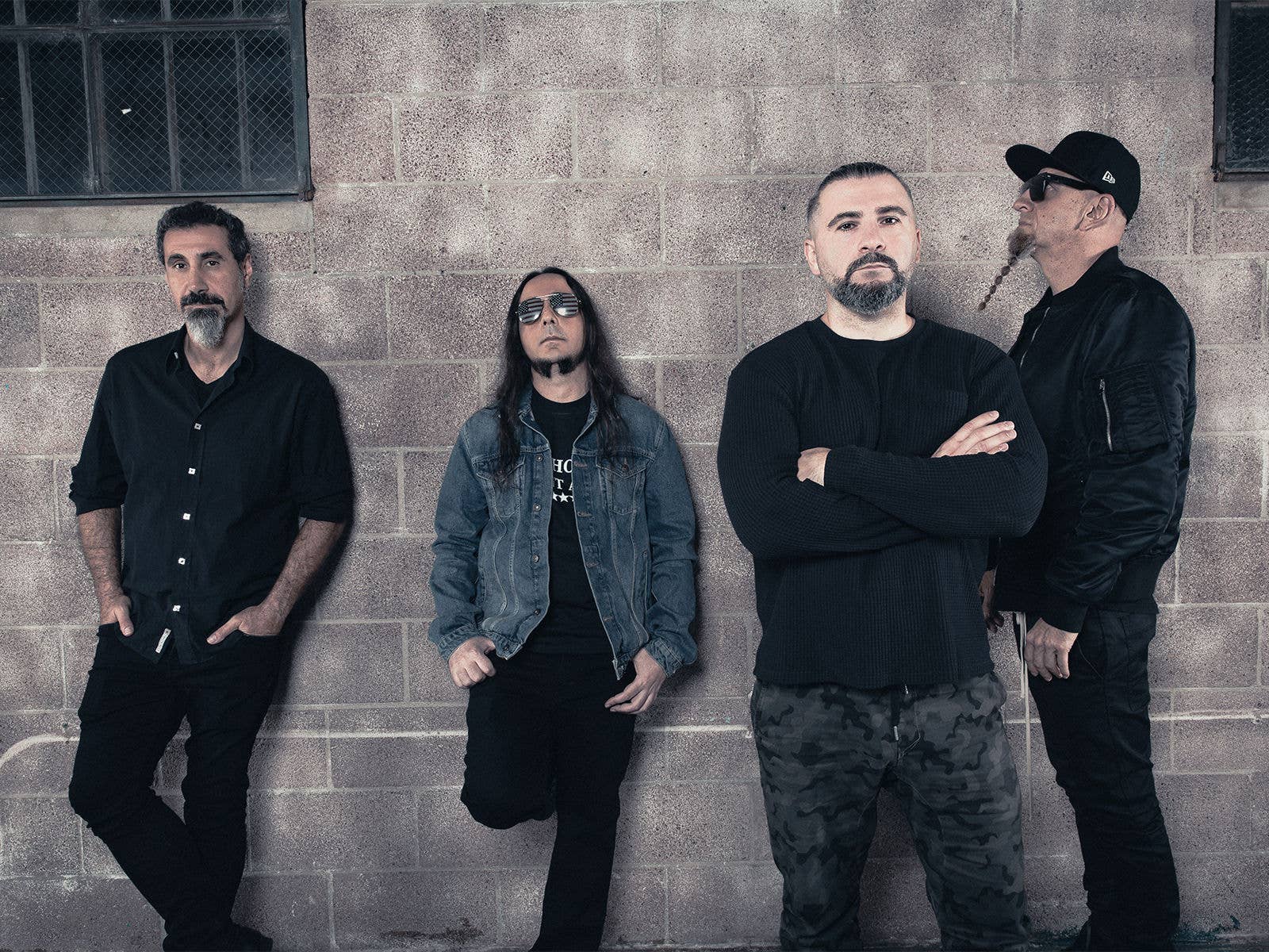 An image of the members of the band System of a Down 