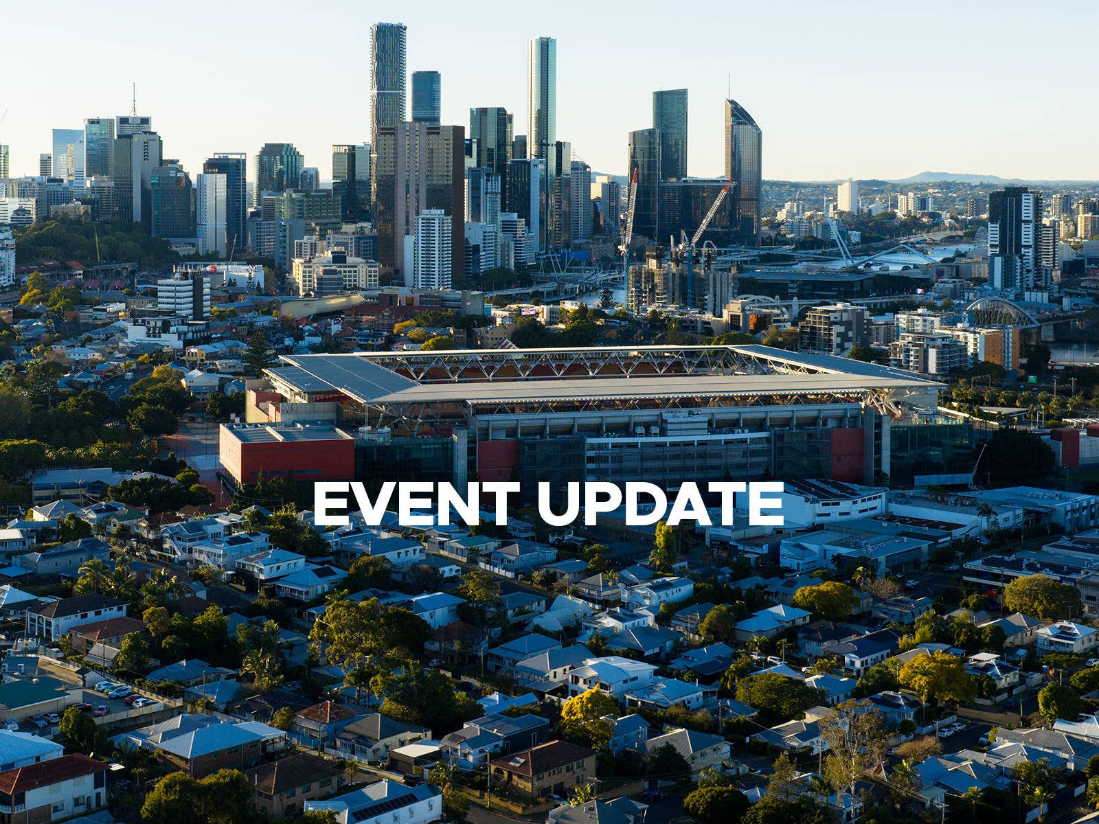 An aerial view of Suncorp Stadium with text overlaid reading Event Update