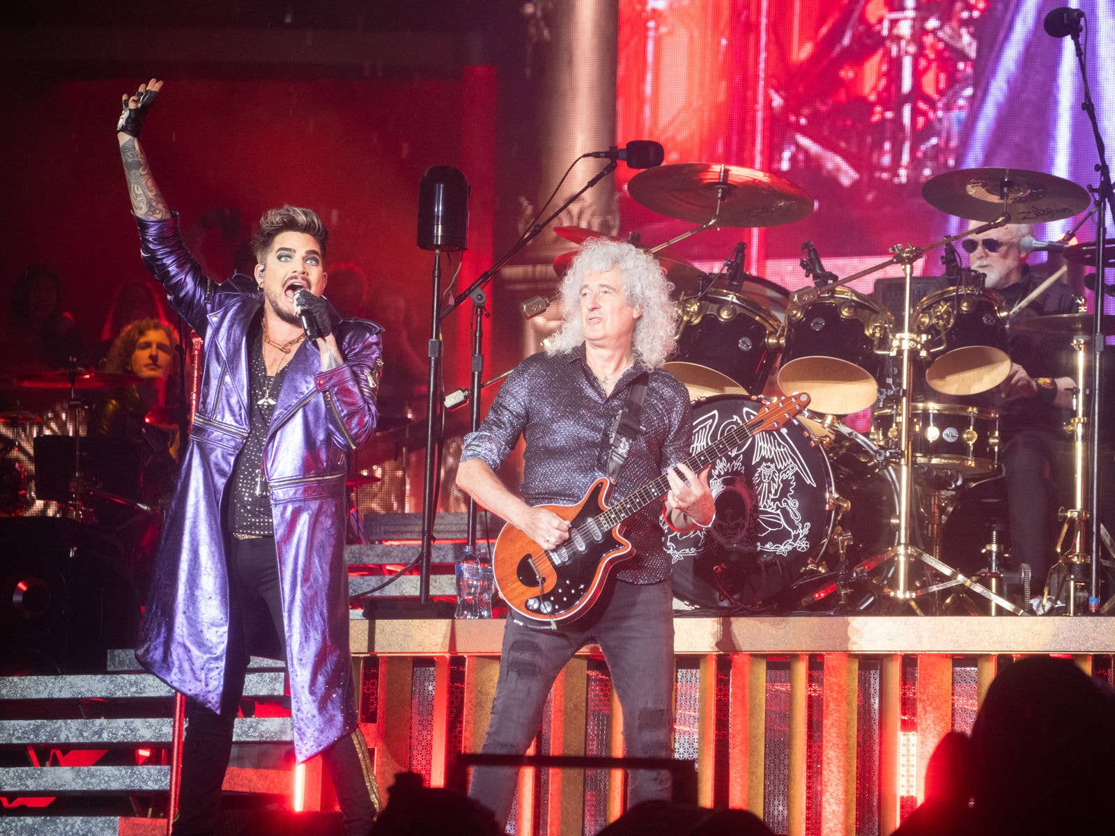 Queen + Adam Lambert on stage at Suncorp Stadium during their Rhapsody Tour in 2020.