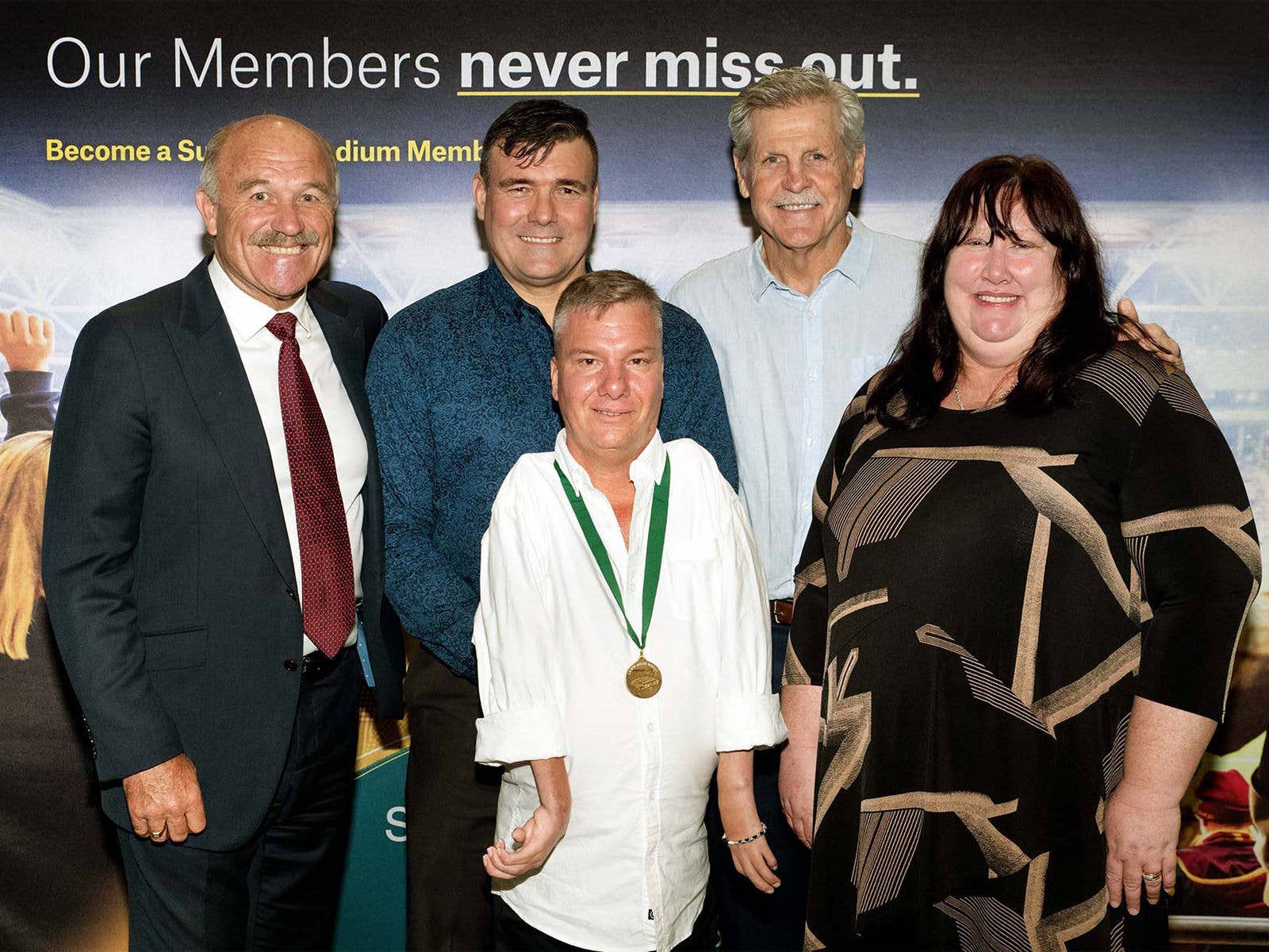 The Lewis Miles Medal Winners for 2021 and 2022 and Team Harmony Award Winner for 2022 with Wally Lewis and Gene Miles. Left to Right: Wally Lewis, Dan Darcy (Lewis Miles Medal Winner 2022), Bruce Camplin (Lewis Miles Medal Winner 2021), Gene Miles, Jodie Bates (Team Harmony Award Winner 2022).