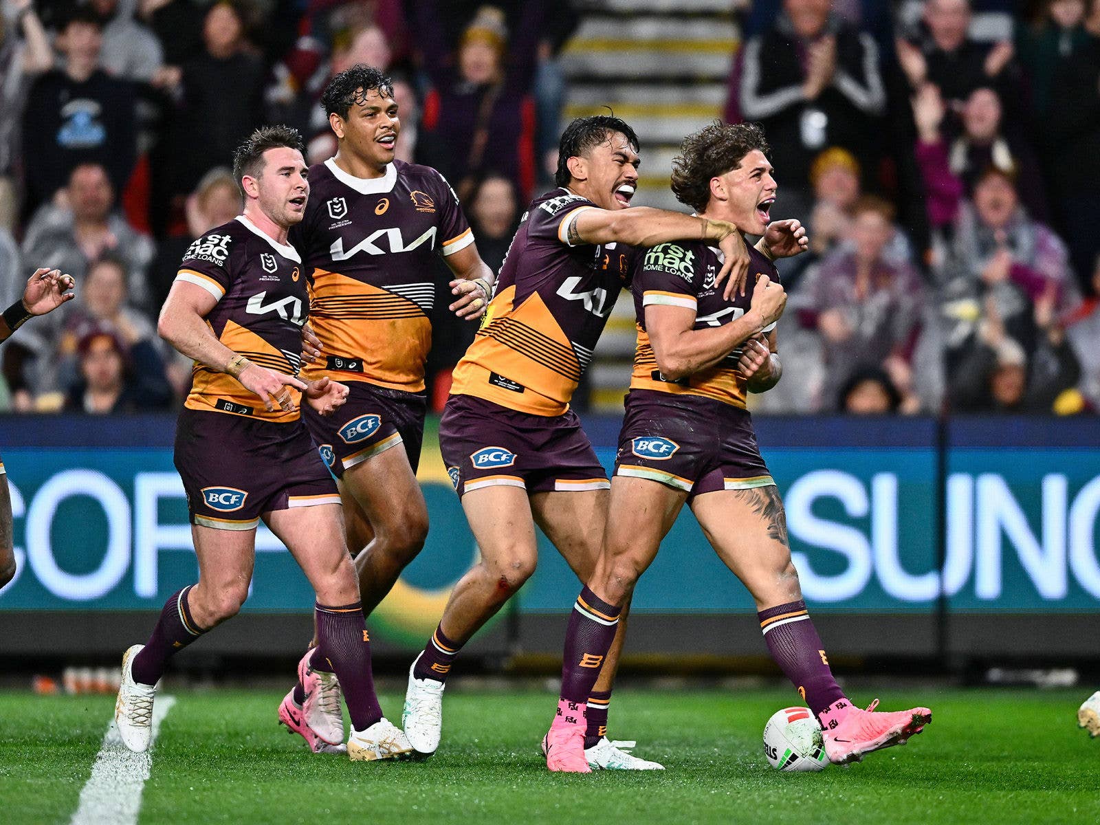 Broncos Try Celebration Broncos players celebrate Reece Walsh scoring a try
