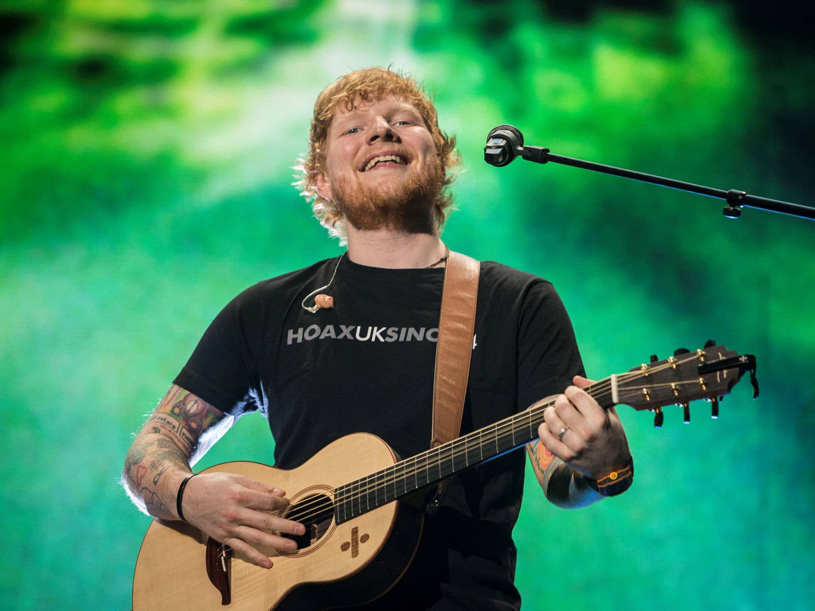 Ed Sheeran on stage at Suncorp Stadium during his Divide Tour in 2018.