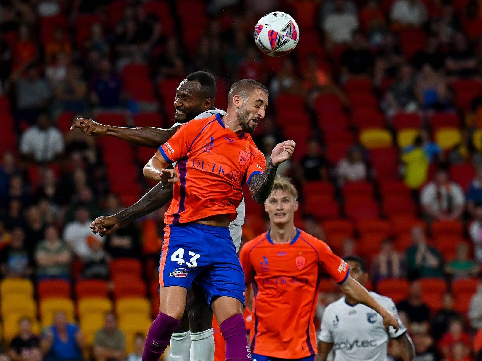 A Brisbane Roar player contesting a header