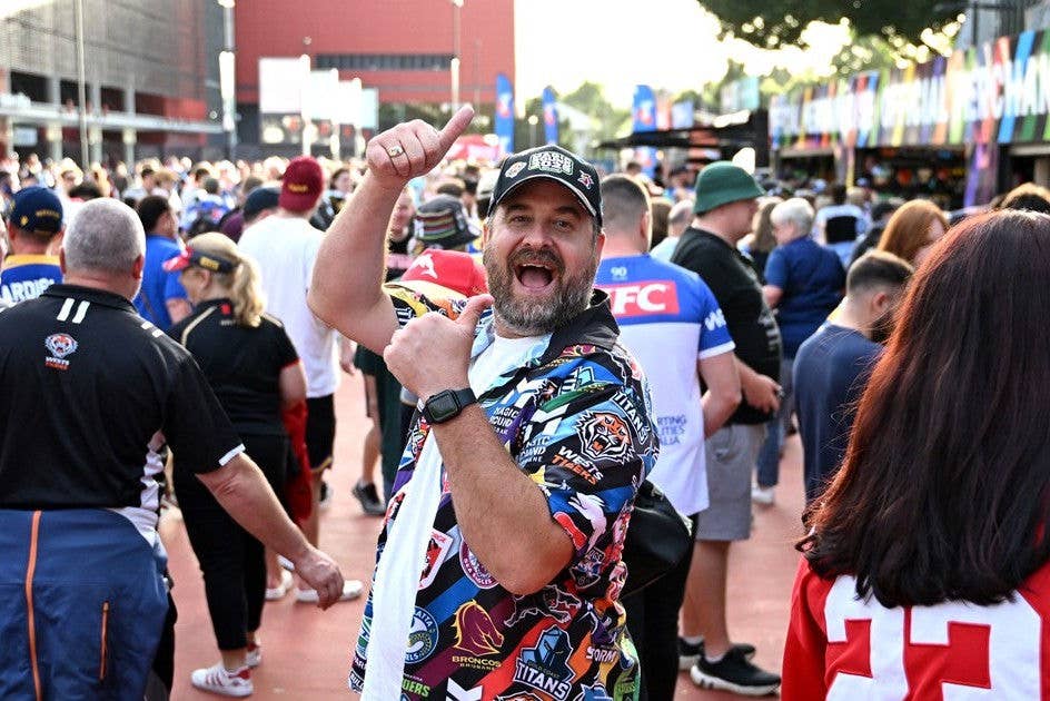 Fan walking into Suncorp Stadium at NRL Magic Round