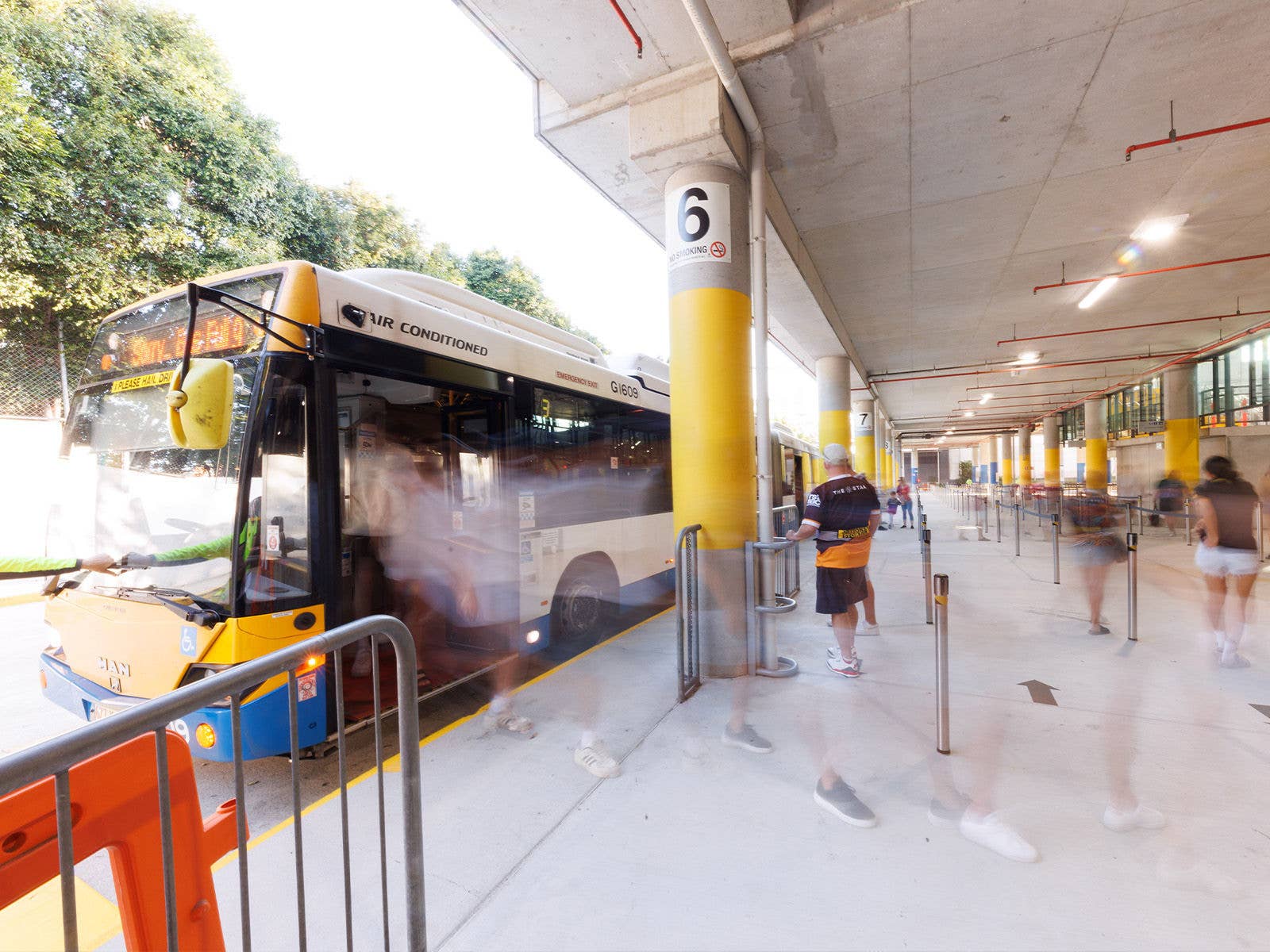 A Brisbane shuttle bus arriving at Suncorp Stadium bus station during the day before an event