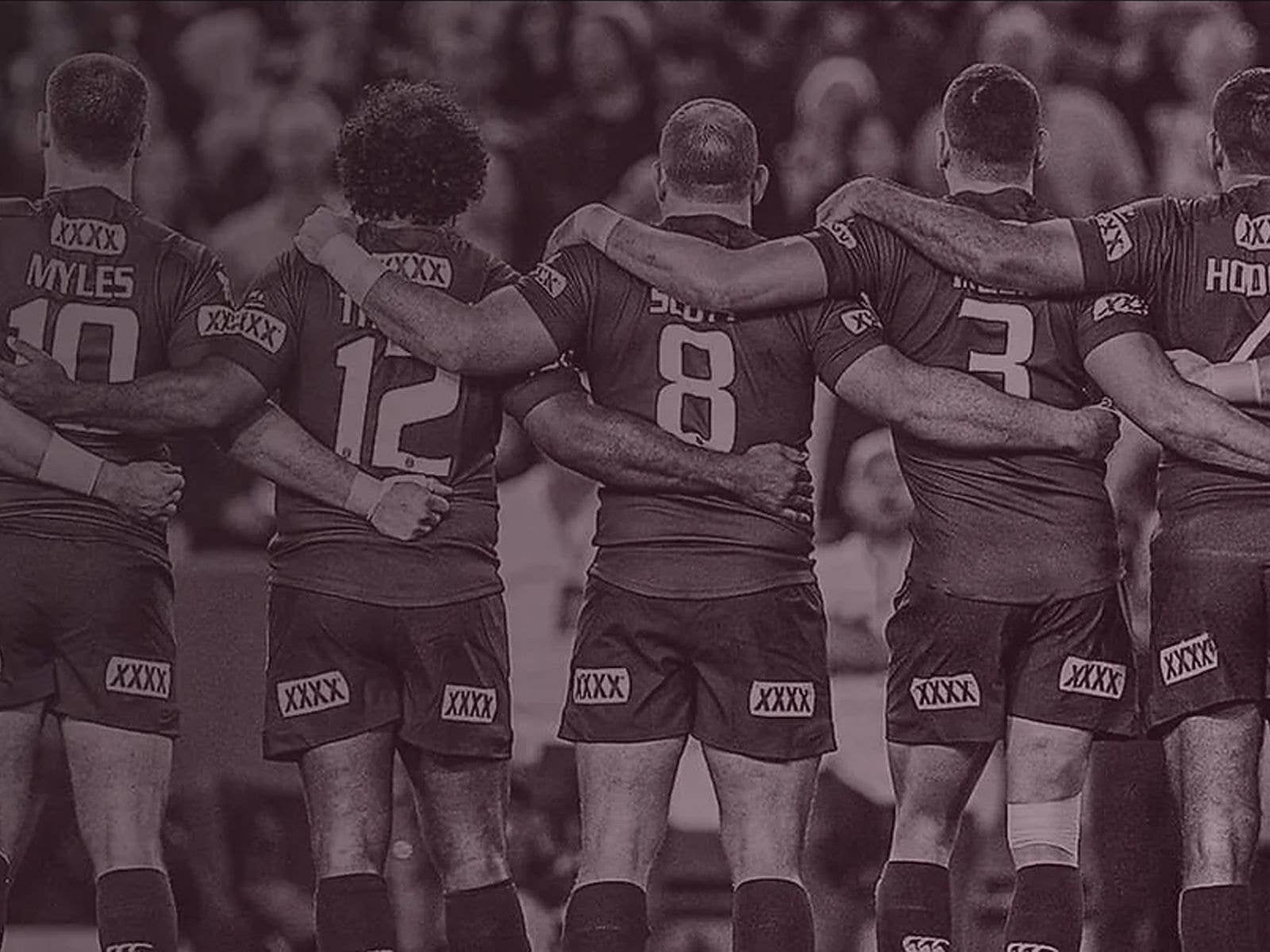 Queensland Origin players lined up arm in arm