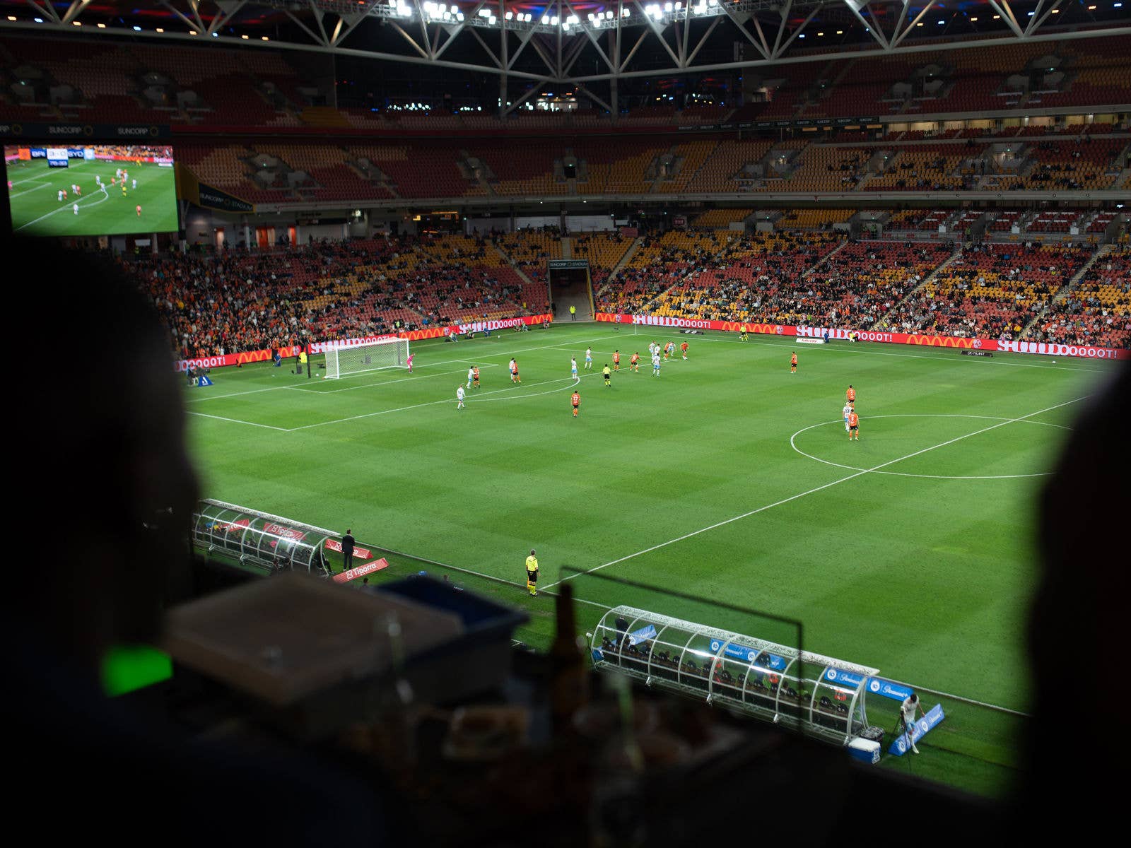 View of field during a Brisbane Roar game from a corporate facility.