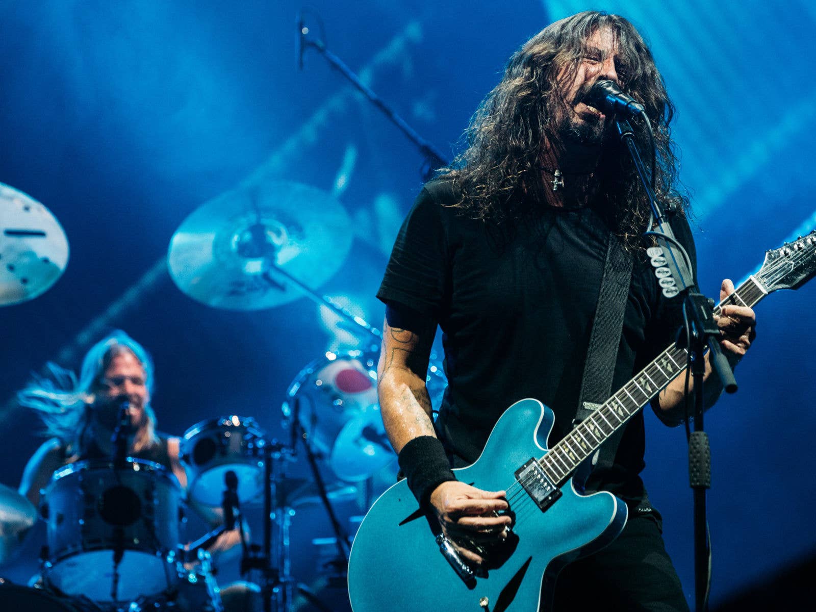 Foo Fighters on stage at Suncorp Stadium during their Concrete and Gold Tour in 2018.