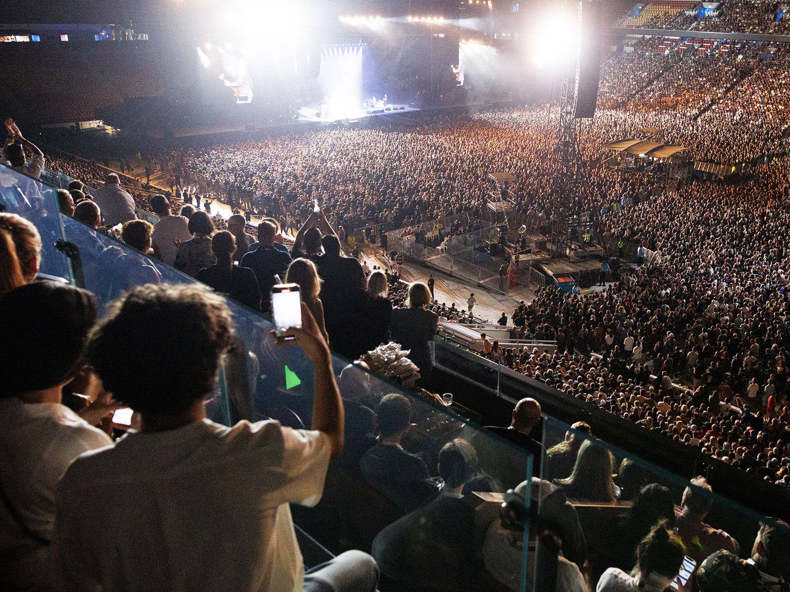 Patron using Suncorp Stadium's Free Wi-Fi to record concert.