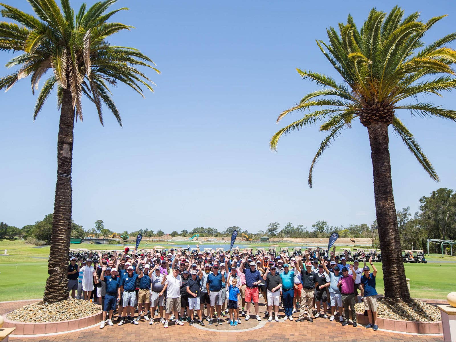 The Suncorp Stadium Charity Golf Day full group shot in front of the course