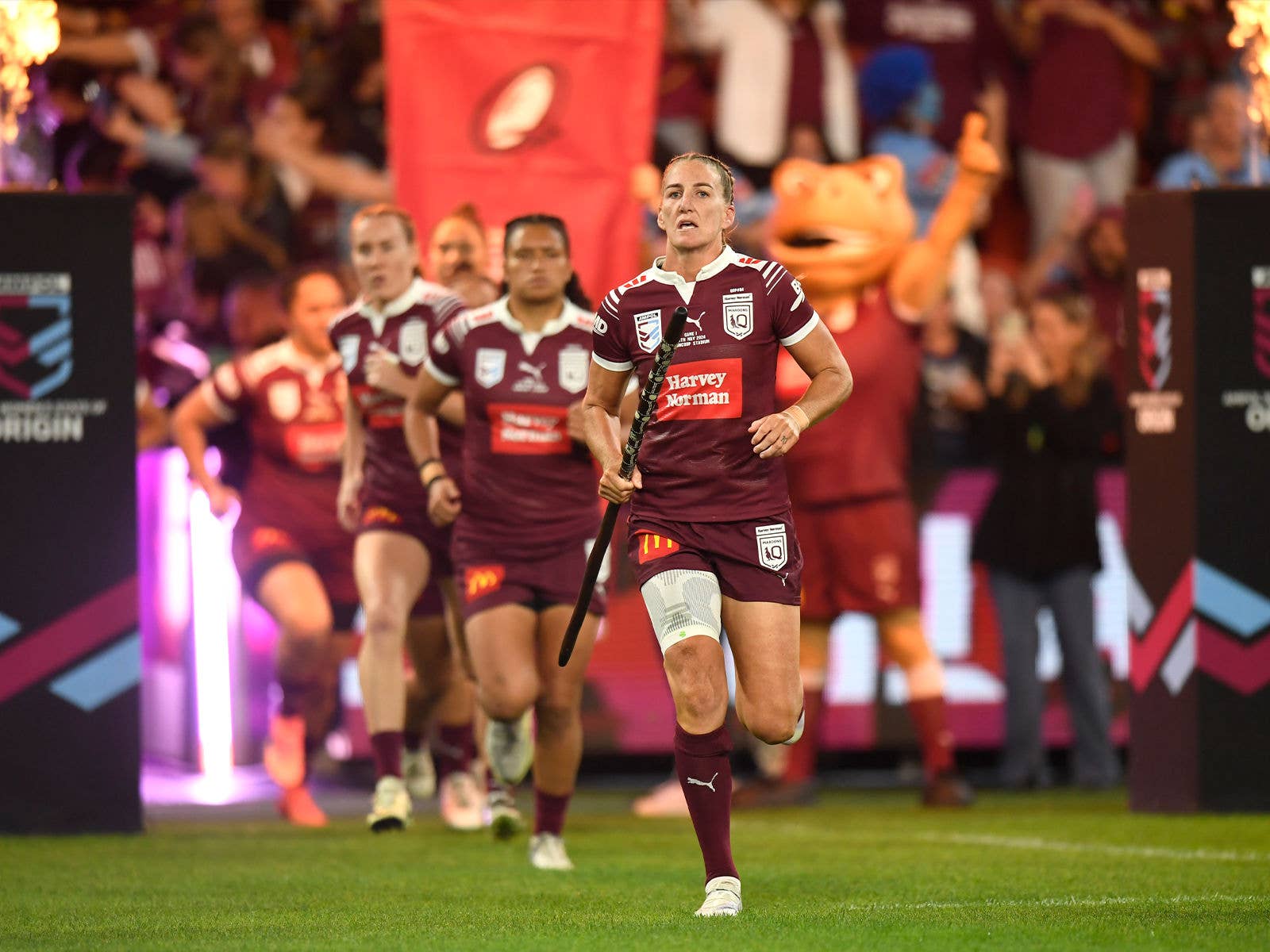 The QLD Womens State of Origin team running out