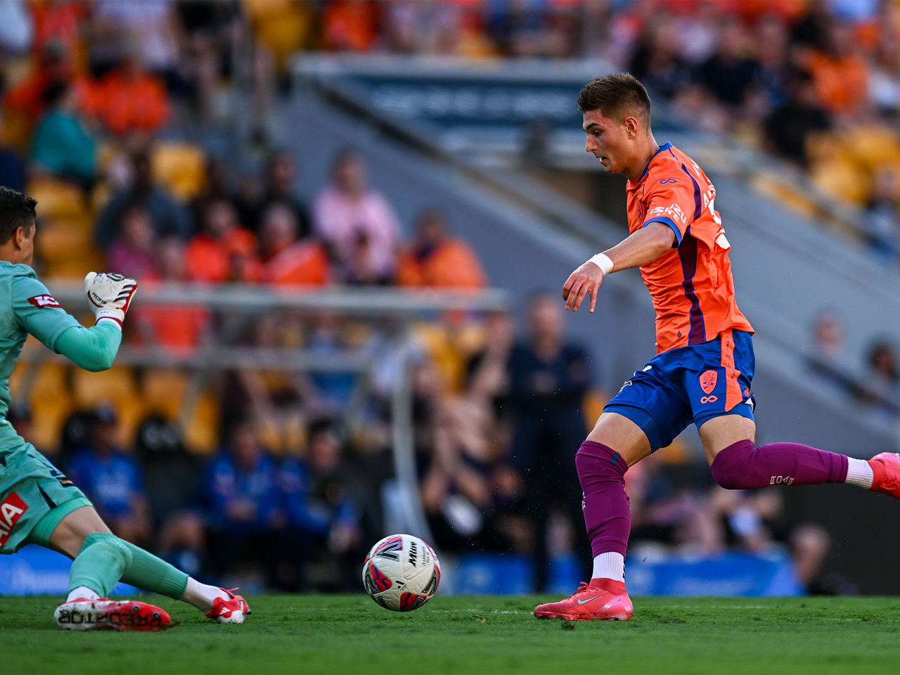 Nathan Amanatidis with the ball
