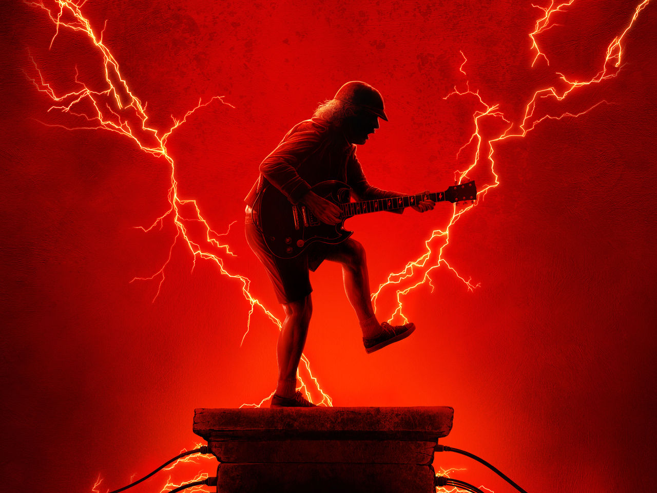 Picture of ACDC guitarist silhouette with red background and lighting