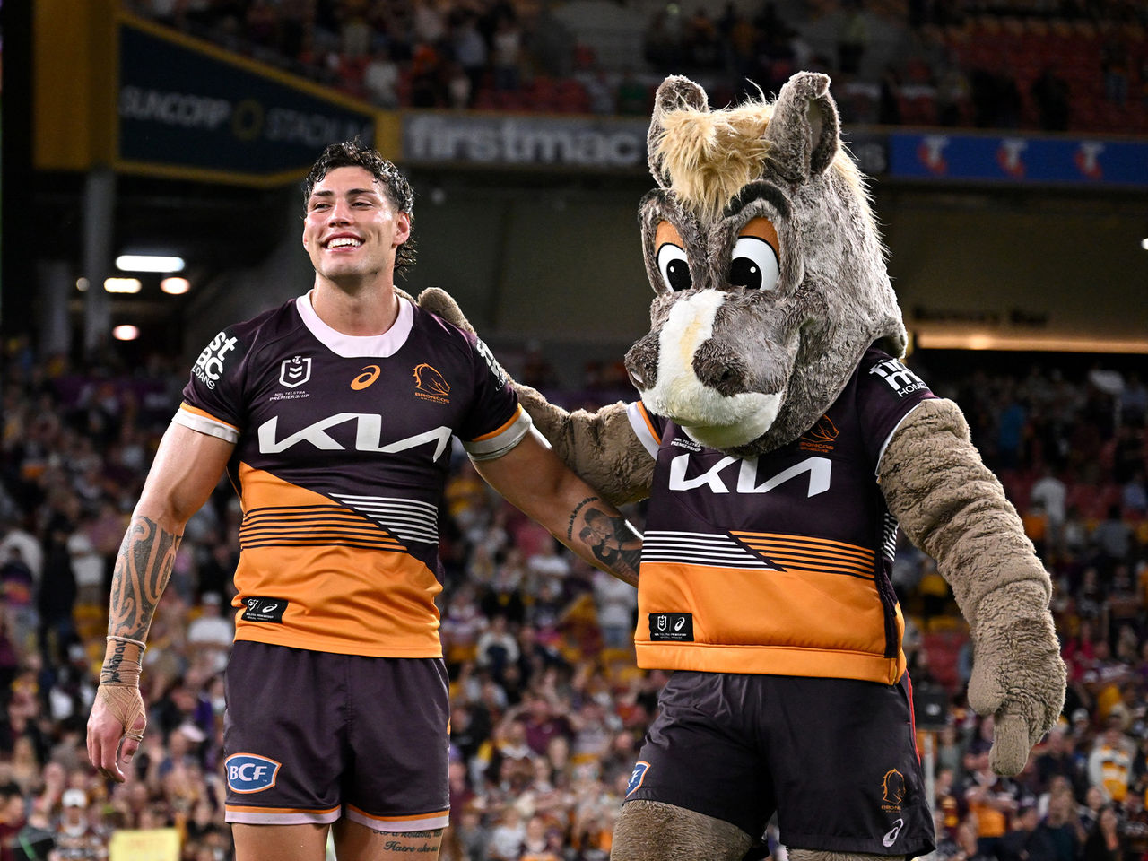 Jordan Riki and Brisbane Broncos Buck Mascot smiling 