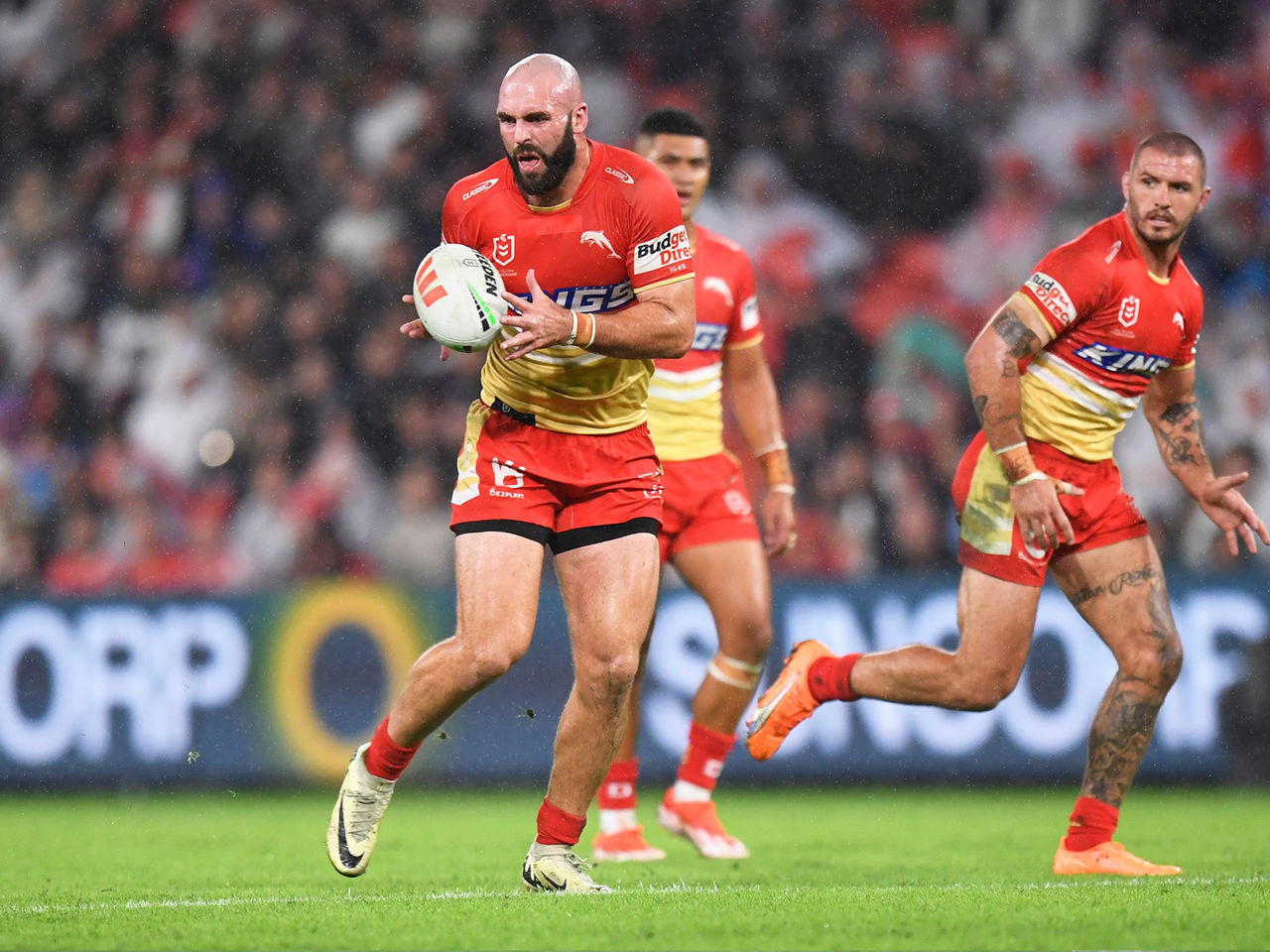 Dolphins player Mark Nicholls catching the ball whilst running