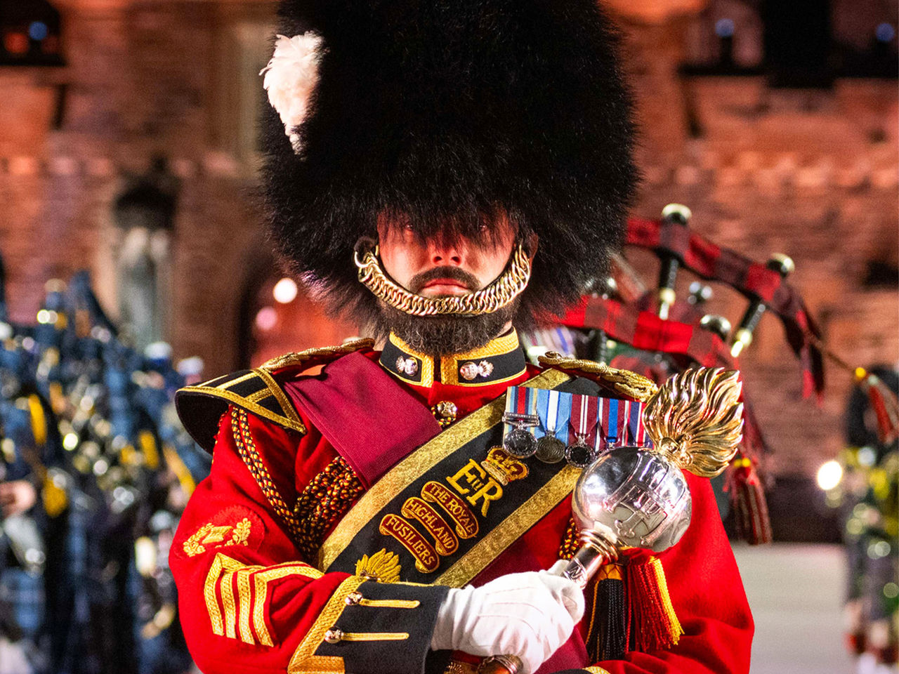 The Royal Edinburgh Military Tattoo photo with a guard during the show